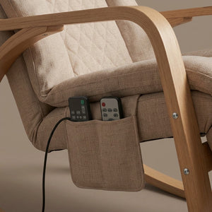 Close-up of the Abbraccio Nookrest side pocket holding the massage remote controls